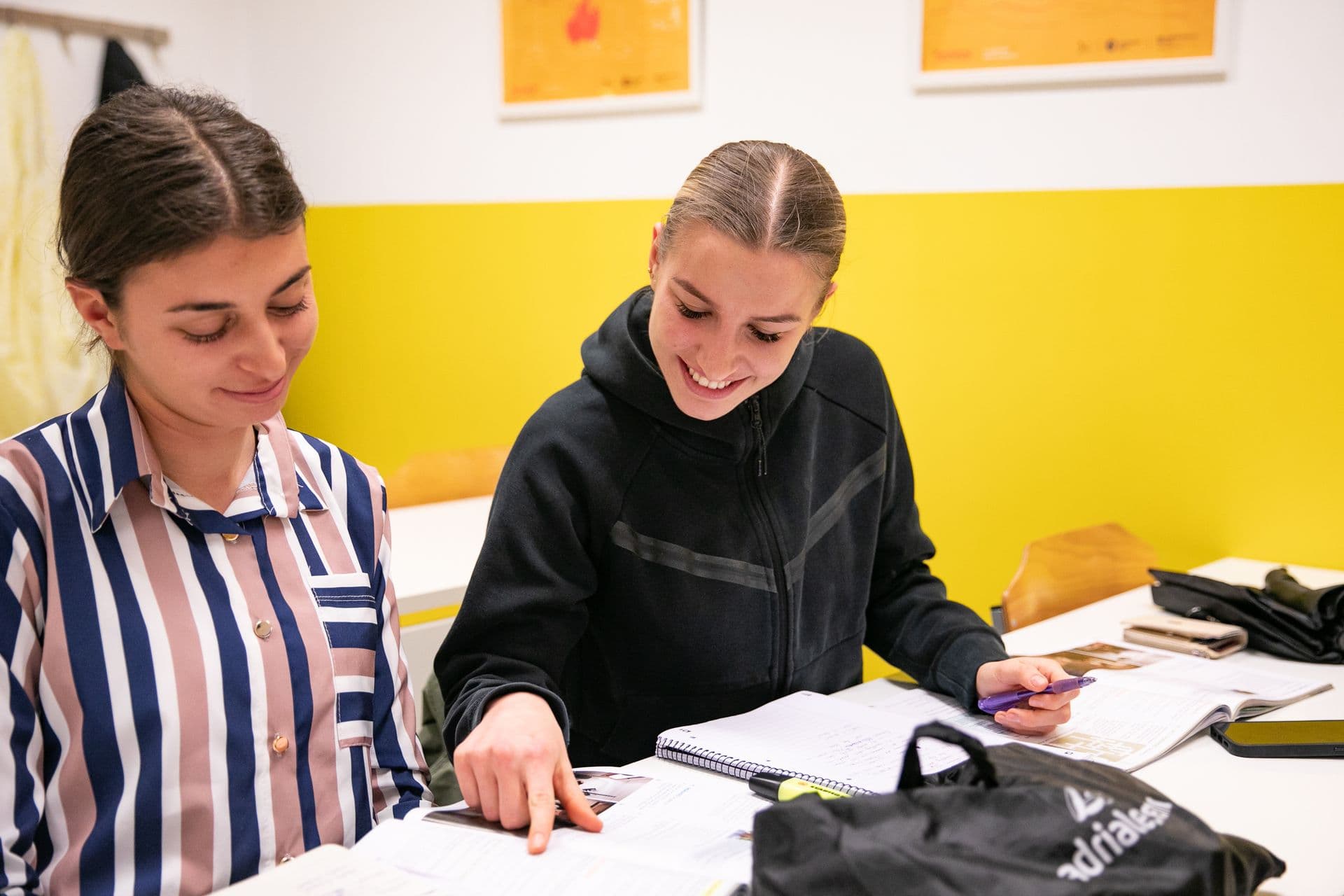 Two students work on a task as a pair